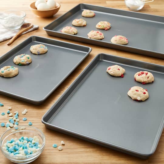6 Packs: 3 ct. (18 total) Non-Stick Cookie Sheet Set by Celebrate It®